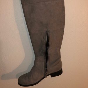 Grey over the knee boots.